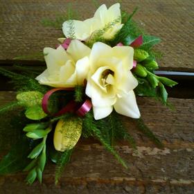 fwthumb09 ivory freesia corsage & wine ribbon loops 11.95.jpg